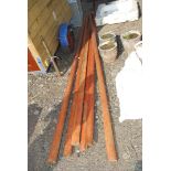 Quantity of half round treated rails,