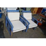 Pair of painted wooden garden chairs with cushions