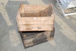 Two wooden apple boxes