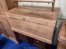 A pine chest with interior candle tray and drawers, 40 1/2" long x 20 1/2" deep x 20" high.