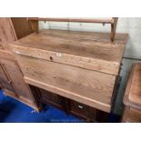 A pine chest with interior candle tray and drawers, 40 1/2" long x 20 1/2" deep x 20" high.