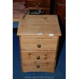 A pine drawer bedside chest.