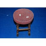 A circular oak framed pub stool.