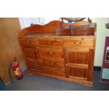 A pine scalloped back dresser unit, 50" x 16" x 46" high.