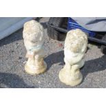 Pair of concrete style seated lions,