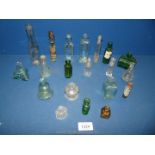 A box of vintage miniature Bottles.
