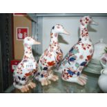 Three oriental graduated patterned Ducks.