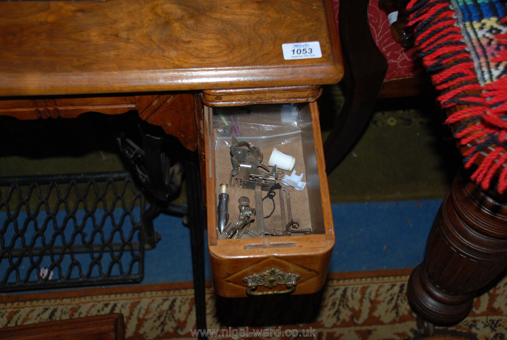 A Singer Treadle sewing Machine, with drawers complete with contents including machine accessories, - Image 4 of 4