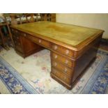 An excellent quality Mahogany Partner's Desk having an attractive mellowed olive green inset