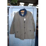 A three quarter length brown Coat with black collar, two front pockets, by Baronia, size 12/14.