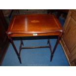 A rectangular Edwardian occasional Table having light and darkwood stringing and crossbanding and