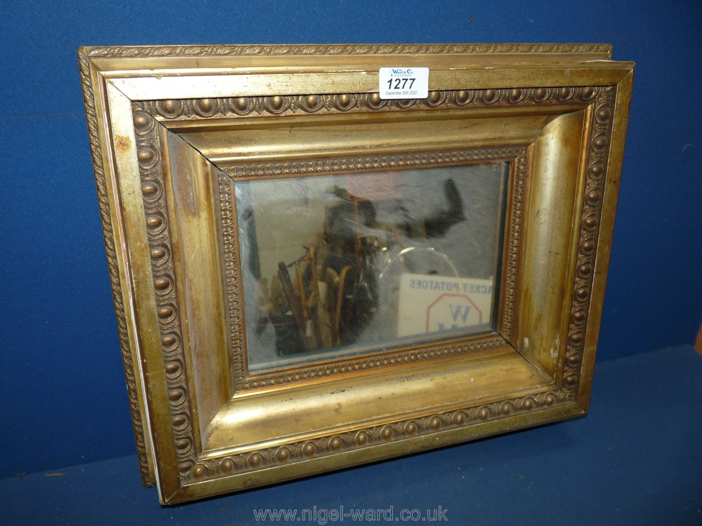 A heavy gilt framed rectangular Mirror,