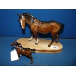 A Beswick mare and foal,