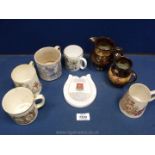 Two Queen Victoria Diamond Jubilee commemorative Mugs, an Edward VII coronation mug,