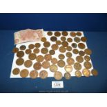 A ten shilling note, 26 half pennies dated 1914-1966 and 33 pennies dated 1906-1967.