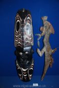 A Tribal Art Papua New Guinea Sepik mask, carved in a dense hardwood and with original pigment,
