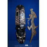 A Tribal Art Papua New Guinea Sepik mask, carved in a dense hardwood and with original pigment,