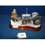 A Border Fine Arts figure group of Ferguson tractor 'An Early Start', boxed, 5 1/2'' tall.