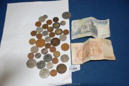 Miscellaneous coins and foreign bank notes.