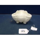 A Royal Worcester figural, white, shell dish. 3" tall, date code for 1959, shape no.