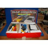 A vintage Scalextric Team Cosworth boxed set.