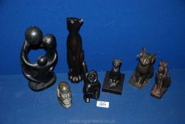 Miscellaneous ornaments including cats, pharaoh cats, stone head tribal art,