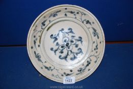 A fine 15th century Annamese dish from the Hoi An cargo, decorated flowers in dark greenish blue.