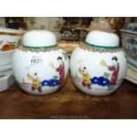 A pair of oriental decoration lidded Ginger Jars, 6'' tall.