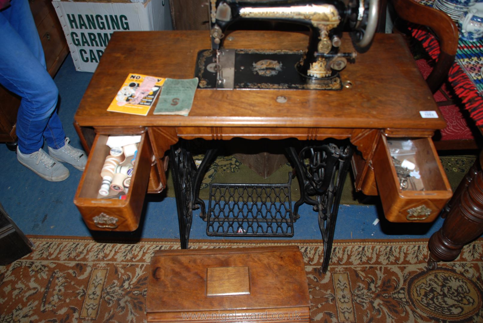 A Singer Treadle sewing Machine, with drawers complete with contents including machine accessories, - Image 2 of 4