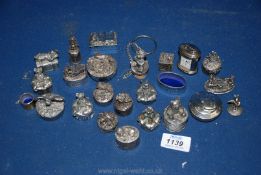A quantity of plated and pewter trinket pots with animals, teddy bears, etc. to lids.