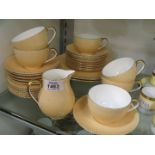 A Wedgwood part tea set in blush ground with gilt beaded edging to include; six cups, ten saucers,