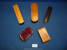 Five old bristle clothes brushes