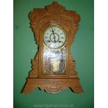 A carved Clock by New Haven clock Co.