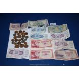 A small quantity of English and foreign coins and miscellaneous foreign notes including dollars,