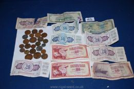 A small quantity of English and foreign coins and miscellaneous foreign notes including dollars,