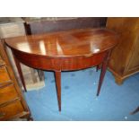 A Mahogany demi-lune Table standing on tapering square legs probably part of a "D" end dining table,