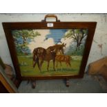 A Fire screen with tapestry depicting mare and foal,