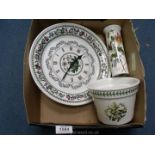 A Portmeirion Botanical Garden wall clock plate, stem vase and flower pot shaped planter.