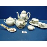 A small quantity of oriental china including teapot, sucrier, cup etc.
