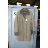 A 'Marcona' three quarter length green Overcoat with dark green collar and turned up sleeves,