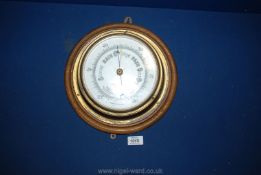 A 1930's circular Barometer by John Barker & Co. Ltd, Kensington, 11'' diameter approx.
