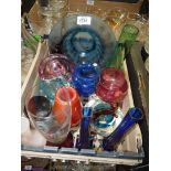 A small quantity of coloured glass including vases and bowls.