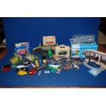 A box of miscellaneous toys to include Corgi and Dinky and a Vanguards Police Escort Diorama Rover