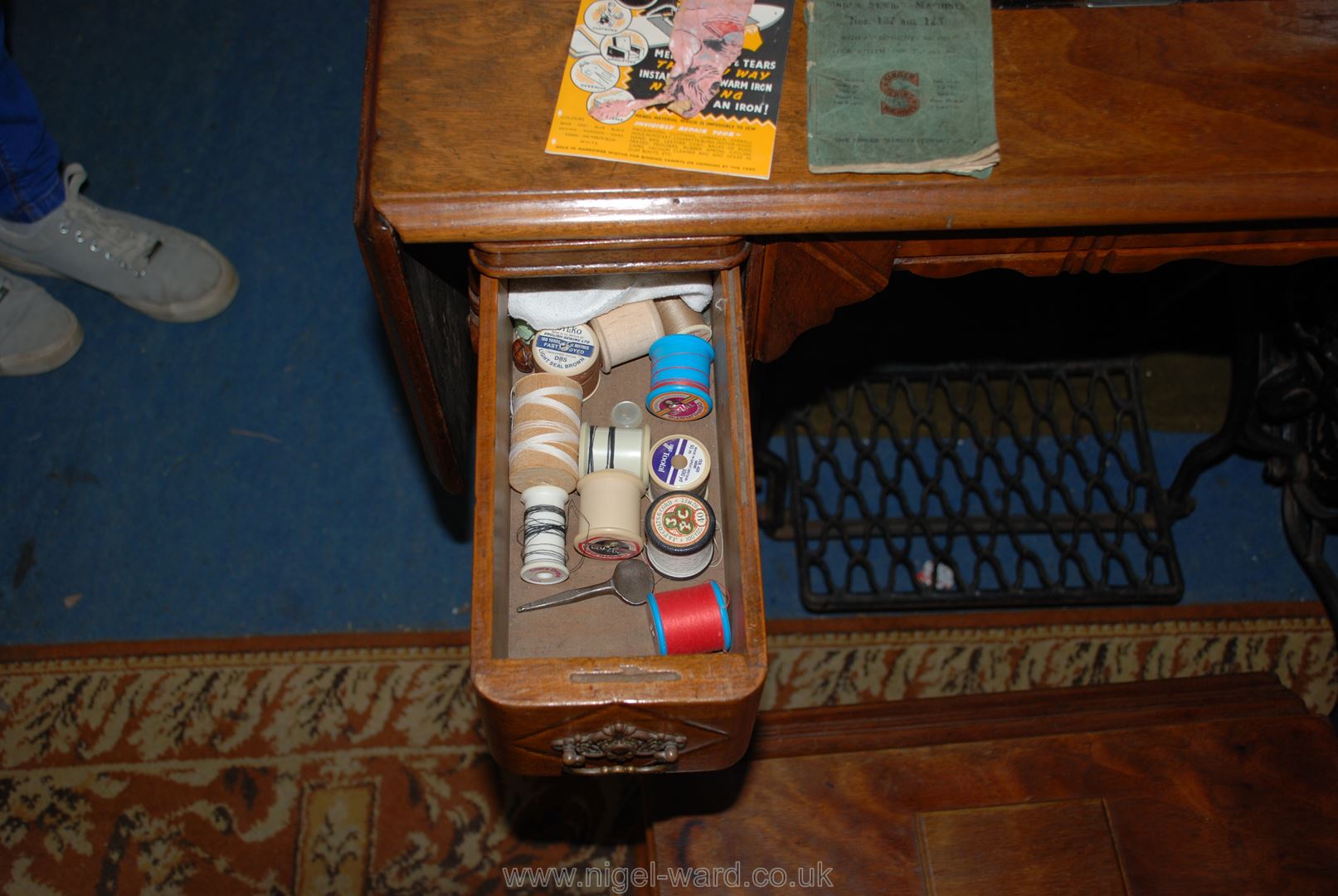 A Singer Treadle sewing Machine, with drawers complete with contents including machine accessories, - Image 3 of 4
