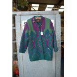 A 'Geiger' multi coloured Pure new wool three quarter length Jacket, purple/green with metal brooch,