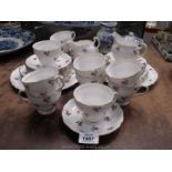 A Colcough part tea service, with pink rose and gold rim pattern, to include; ten cups and saucers,
