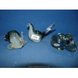 Three paperweight glass animals including snail, bird and hippopotamus being handmade,