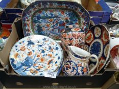 A quantity of Imari and Chinese porcelain including plates, jugs, etc.