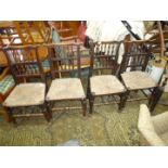 A set of four antique Mahogany framed Dining Chairs and one matched carver chair,