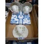 Three Belleek cups and saucers with black and green marks to base and a boxed set of Portmeirion